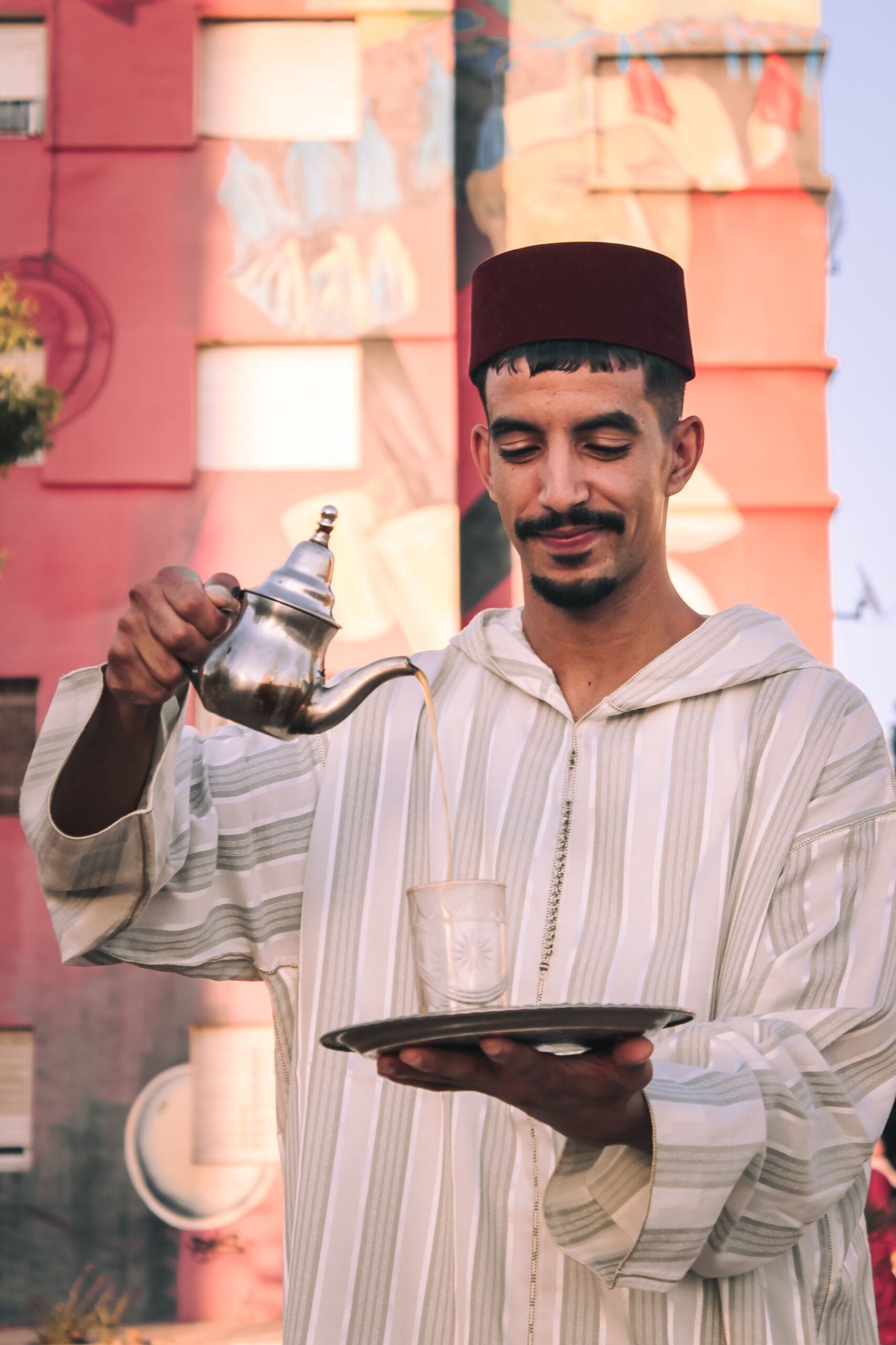 Morocco tourism: pouring traditional mint tea