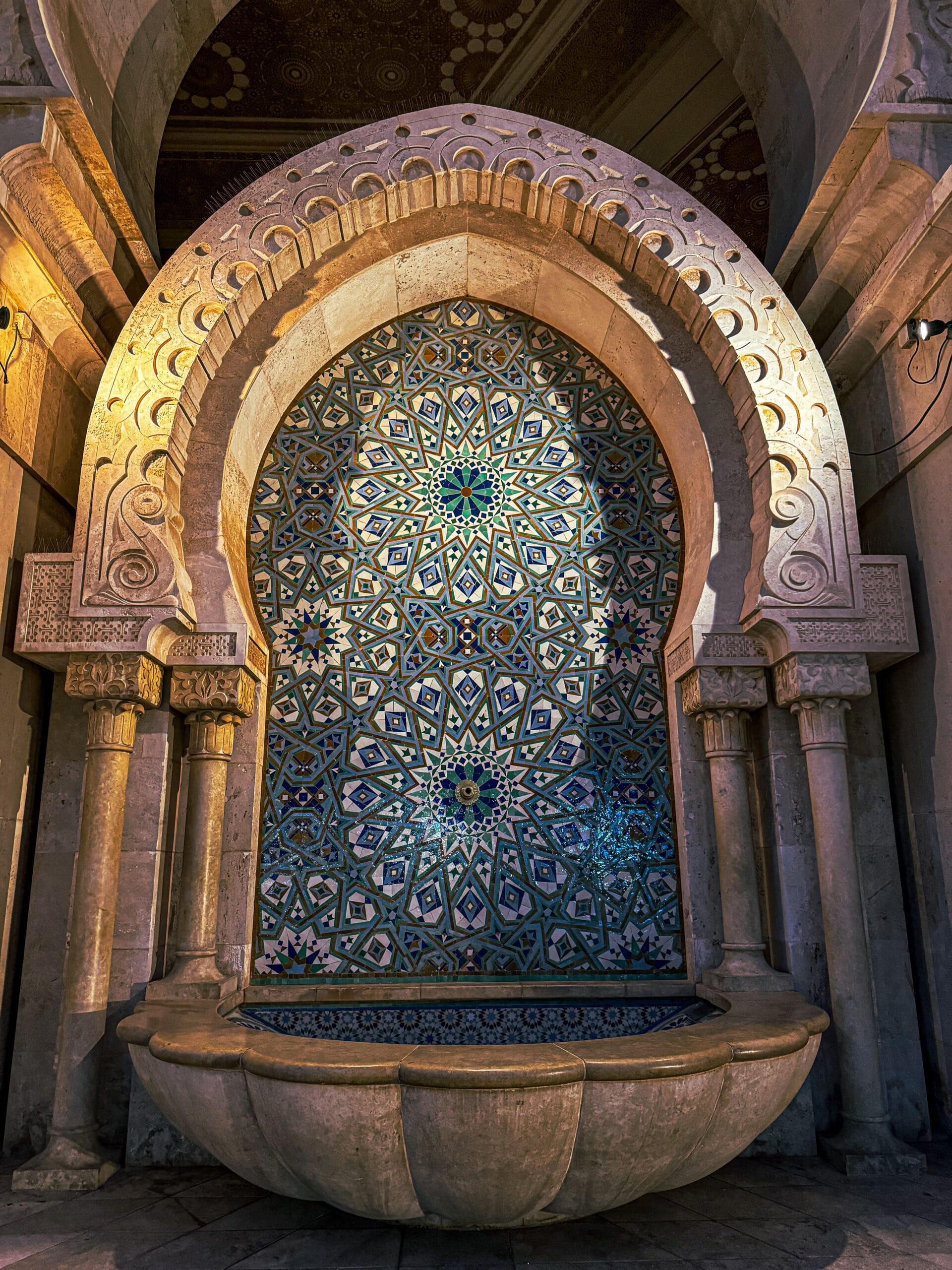 Traditional zellige tilework on a Moroccan riad wall
